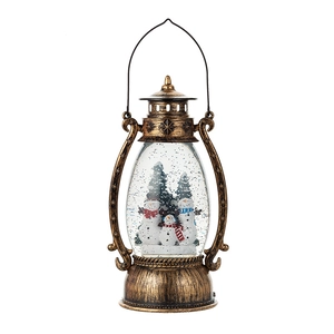 Retro bronze Christmas lantern snow globe with snowmen and swirling glitter
