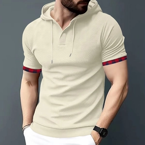Close-up of men's beige hooded t-shirt with knit texture and plaid cuff details