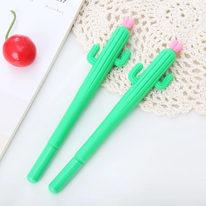 Creative green cactus soft gel pens with pink flowers in a bright office desk setting