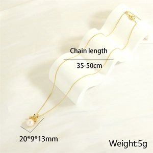 Detail view of 18K gold plated crown pendant necklace with freshwater pearl and dimensions