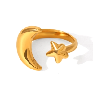 Macro detail of adjustable gold moon and star ring with polished metallic finish