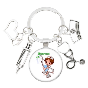 Silver stethoscope and nurse cap keychain with heart charm and Hospital illustration