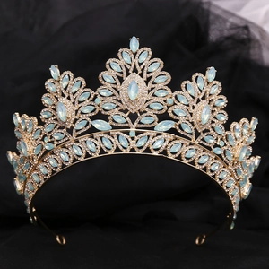 Baroque golden bridal crown featuring light blue teardrop crystals and clear rhinestones