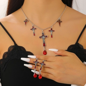 Gothic silver necklace and earrings set with red cross charms and teardrop crystals