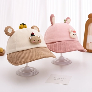 Detailed view of children's corduroy hats featuring cute bear and rabbit ears design