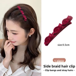 Close-up of 9.5cm wine red velvet braided hair clip for side fringe and styling