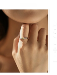 Macro detail of S925 silver ring featuring a square yellow gem and pave diamonds