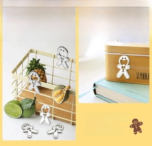 Polished silver gingerbread man magnet and bottle opener shown in a lifestyle scene
