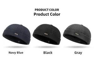 Detail of diamond-quilted miki hats in navy, black and grey with FEWK metal logo