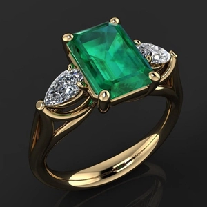 Luxurious gold ring featuring emerald cut green zircon and pear side stones for men