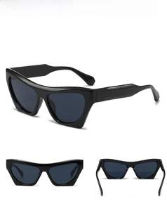 Three-angle view of black cat-eye sunglasses with dark grey lenses and sleek frames