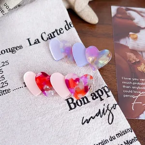 Elegant acetate heart-shaped hair clip set with marble texture and pastel colors