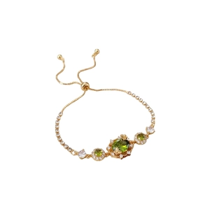 Bracelet plaqué or avec pierres précieuses vertes ovales et chaîne réglable pour femme