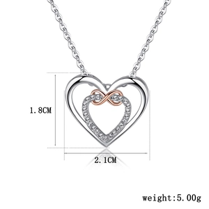 Two-tone heart infinity necklace in silver and rose gold with diamond accents