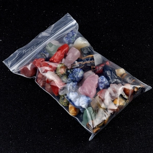 Assorted natural crystal mini wolf and animal carvings in a mixed bulk polybag