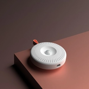 Close-up of the modern white sensor device with orange handle and infrared lens features