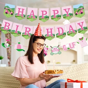 Pink and green golf birthday party banner with Happy Birthday lettering and decorations