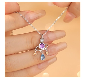 S925 silver planet necklace detail with purple zircon and light blue water drop pendant