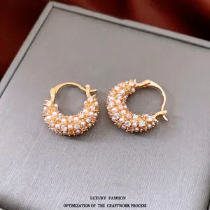 18k gold plated round earrings with inlaid white pearls and sparkling crystal stones
