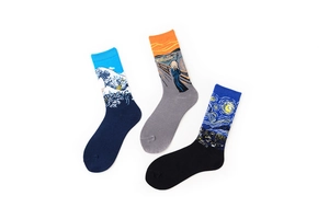 Detailed knit texture of oil painting socks featuring The Great Wave and Starry Night