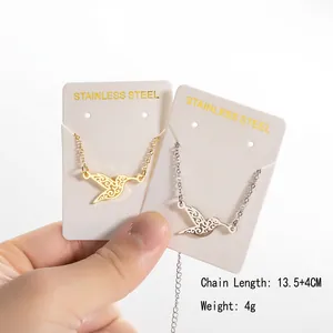 Minimalist hummingbird pendant necklaces in gold and silver stainless steel finish