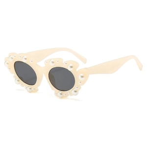 Fashionable cream sunglasses with flower pearl embellishments and dark grey lenses for women