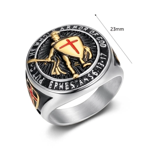 Close-up of 23mm vintage gold templar knight ring with red cross shield relief detail