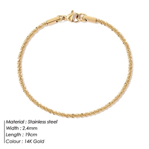Macro detail of 2.4mm twisted stainless steel chain bracelet with 14K gold lobster clasp