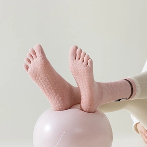 Pink yoga five-toe mid-calf socks with silicone grip and cute panda embroidery