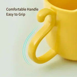 Cartoon kitten plastic mouthwash cup with ergonomic S-curve handle in bright yellow