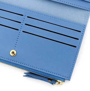 Vue détaillée de l'intérieur du portefeuille bleu avec emplacements cartes et zip doré