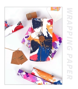 Artistic gift wrapping paper set with colorful patterns, twine, and Happy Day tags