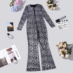 Detailed view of silver leopard print jumpsuit with wide-leg design and front zipper