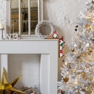L-shaped wooden XMAS door frame decoration featuring Santa and gnome on a white mantel