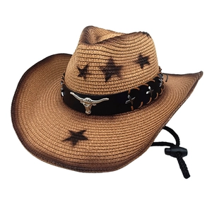 Vintage straw cowboy hat with bull head ornament and star pattern details
