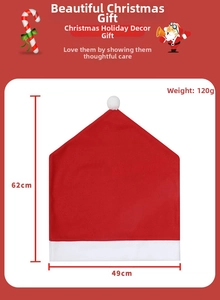 Detail showing red Christmas hat chair cover with white pompom, measuring 62cm by 49cm