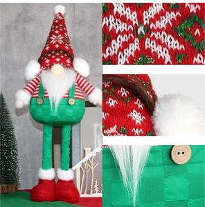 Detail of Christmas gnome with telescopic legs and premium knitted fabric texture