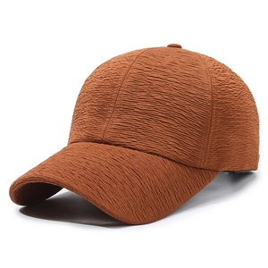 Minimalist caramel brown baseball cap with unique horizontal pleated fabric texture