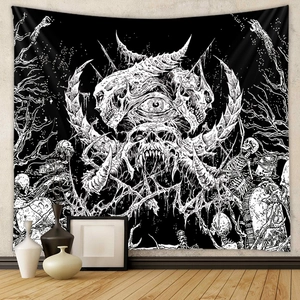 Detailed macro view of black and white gothic tapestry with skulls and monsters