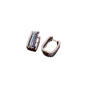 Three-row zircon hoop earrings with white, light blue, and dark blue stones in silver