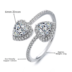 Detail of silver plated open ring with double 6mm heart-shaped cubic zirconia