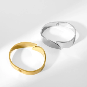 Polished stainless steel wide open bangles in gold and silver leaf overlapping design