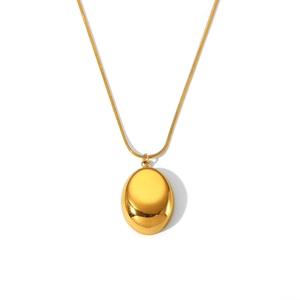 Macro detail of 18K gold-plated oval pendant with sleek snake chain texture