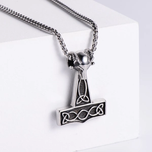 Silver Viking Thor's hammer Mjolnir necklace with ram head and Celtic knot design