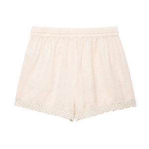 Close-up of beige knit shorts with elastic waist and intricate crochet lace hem detail