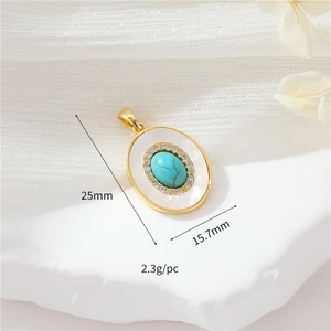 Detailed view of oval gold pendant with white shell and turquoise, 25mm length and 2.3g weight