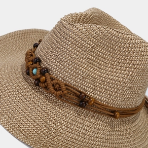 Women's handmade straw sun hat with bohemian beaded band and turquoise accent