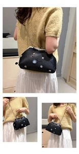 Vertical collage showing floral embroidered bag with chain strap carried as shoulder and handbag