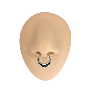 Polished silver G23 titanium seamless septum ring shown on a realistic nose model