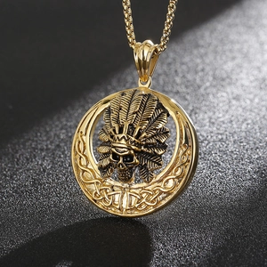 Golden Indian chief skull necklace pendant with feather crown and intricate Celtic knot ring